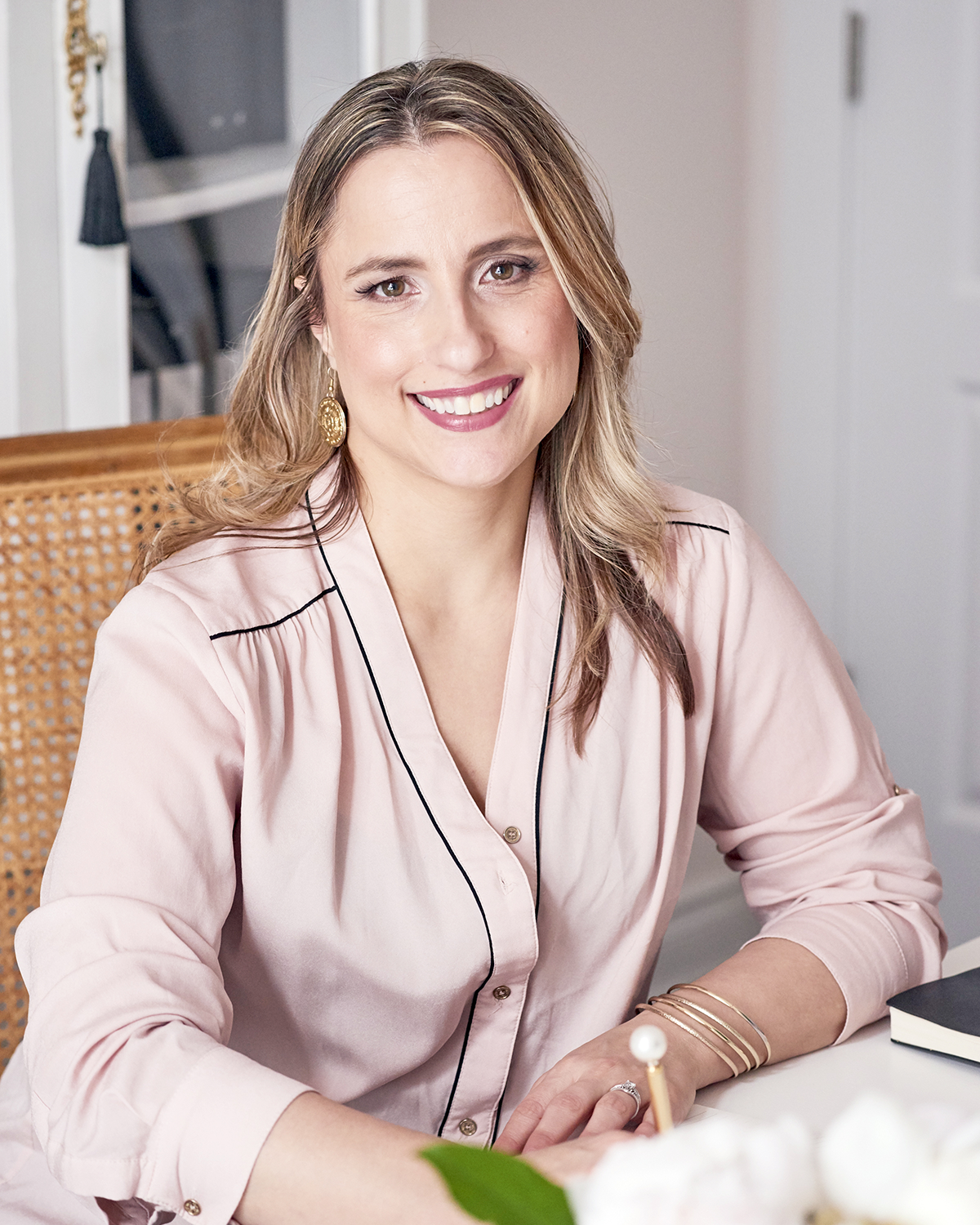 Paige Smith Freelance Presentation Designer at desk